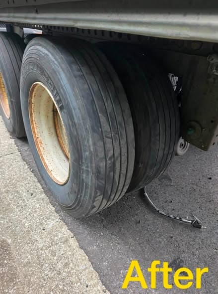 Truck tire repaired on-site by Port City Repair